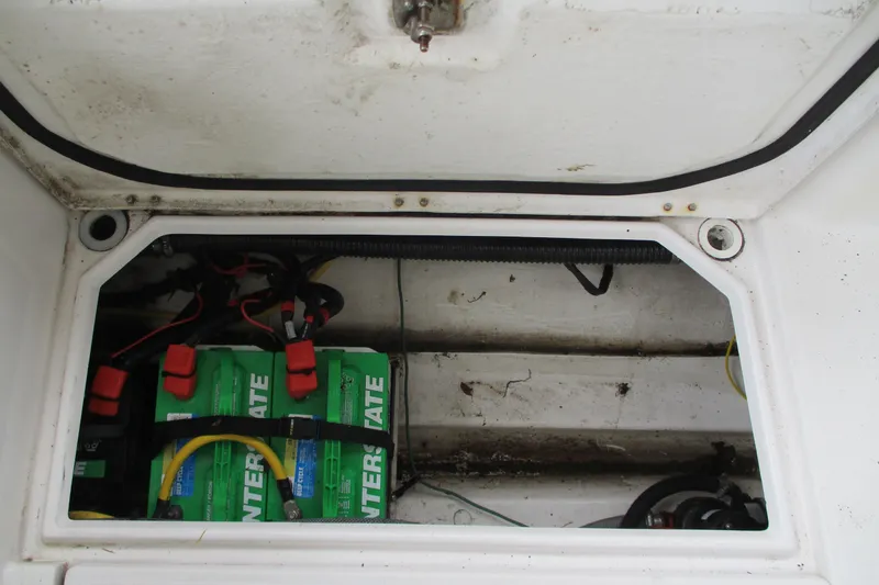 Slide: The Image of Battery compartment of 2018 Cutwater C-24 boat with Interstate batteries. - 40