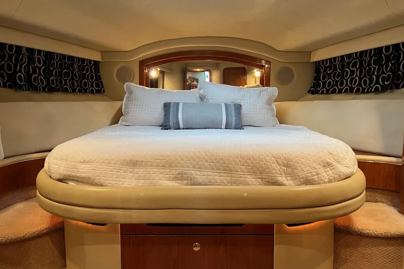 Slide: The Image of Luxurious bedroom interior of 2000 Sea Ray 400 Sedan Bridge yacht. - 56