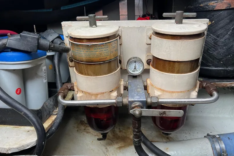 Slide: The Image of Fuel filter system in a 2000 Sea Ray 400 Sedan Bridge engine room. - 62