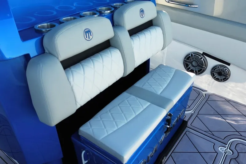 Slide: The Image of 2023 Mystic Powerboats M3800 interior with luxurious seating and modern design. - 24