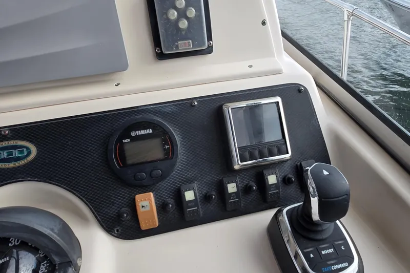 Slide: The Image of Control panel of a 2005 Grady-White Marlin 300 boat with Yamaha tachometer. - 10