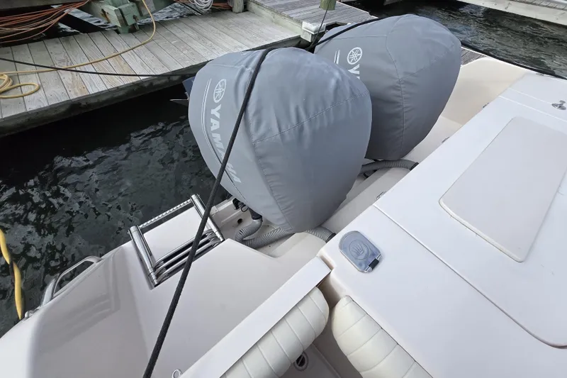 Slide: The Image of 2005 Grady-White Marlin 300 boat with Yamaha engine covers at dock. - 13