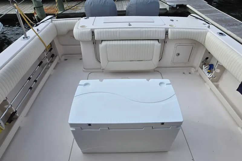 Slide: The Image of 2005 Grady-White Marlin 300 boat interior with seating and storage area. - 7