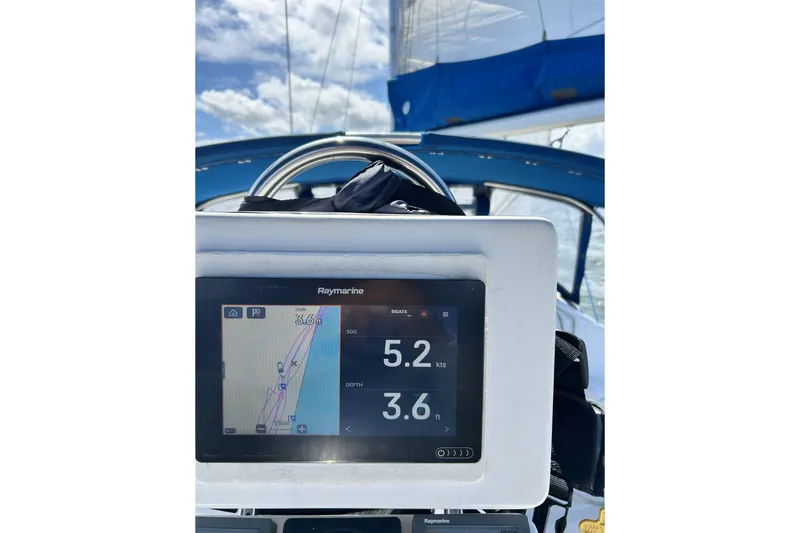 Slide: The Image of 1999 Catalina 28 MkII yacht bathroom with toilet, sink, and wooden accents. - 10