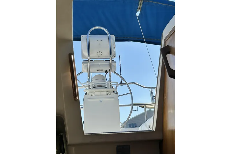 Slide: The Image of Catalina 28 MkII sailboat cockpit with Raymarine navigation display, 1999 model. - 13