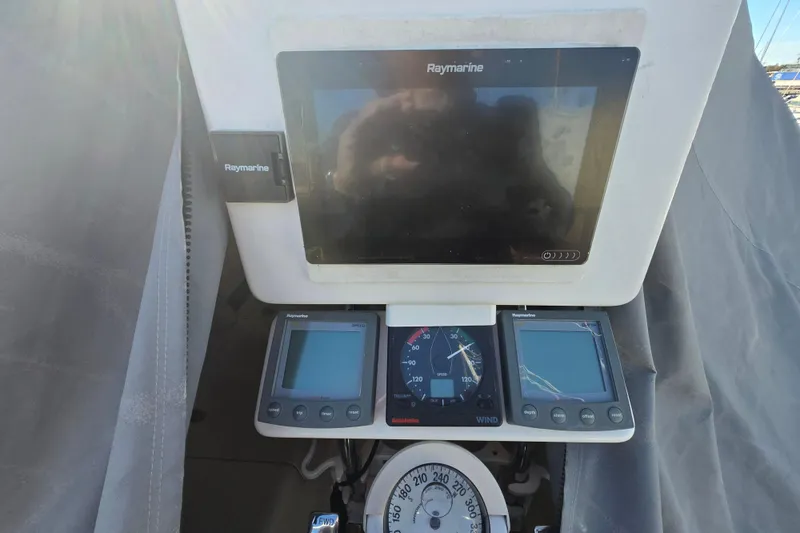 Slide: The Image of Cockpit instruments of a 1999 Catalina 28 MkII sailboat with Raymarine displays. - 46