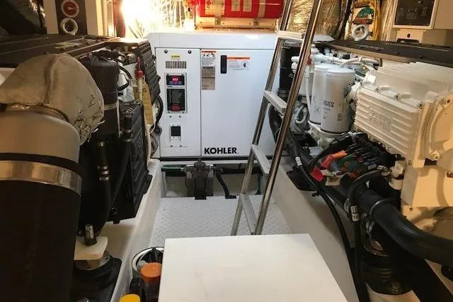 Slide: The Image of Engine room of 2014 Cruisers Yachts 41 Cantius with Kohler generator. - 14