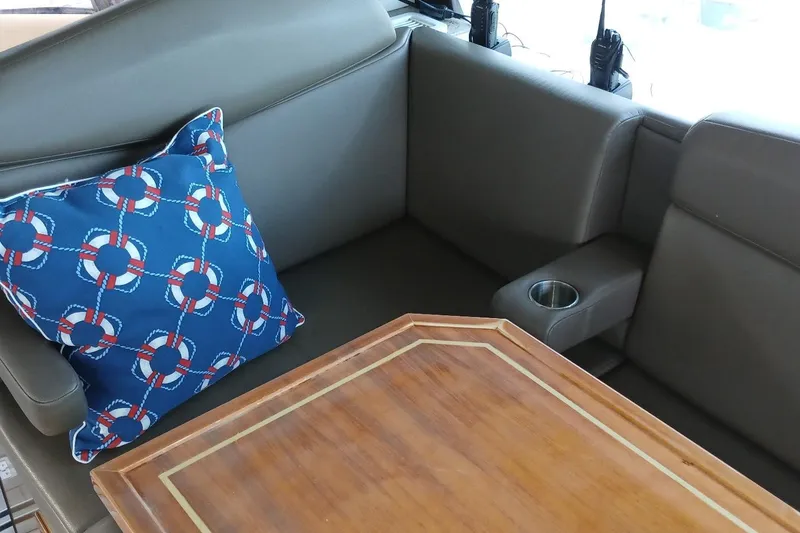 Slide: The Image of Luxurious interior of 2014 Cruisers Yachts 41 Cantius with nautical-themed pillow. - 16