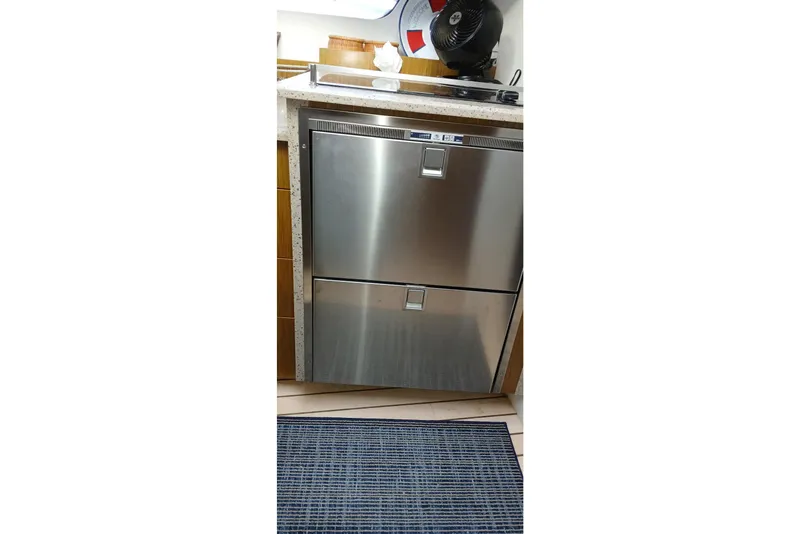Slide: The Image of Stainless steel refrigerator in 2014 Cruisers Yachts 41 Cantius galley. - 24