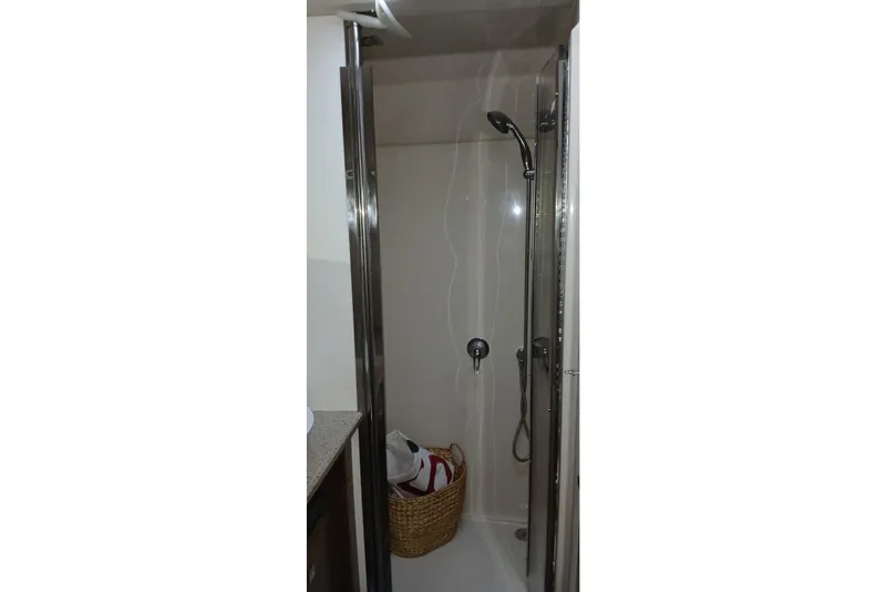 Slide: The Image of Shower area in 2014 Cruisers Yachts 41 Cantius with modern fixtures and basket. - 27