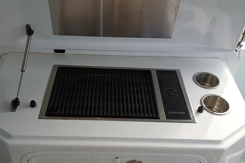 Slide: The Image of Outdoor grill and sink on 2014 Cruisers Yachts 41 Cantius boat. - 7