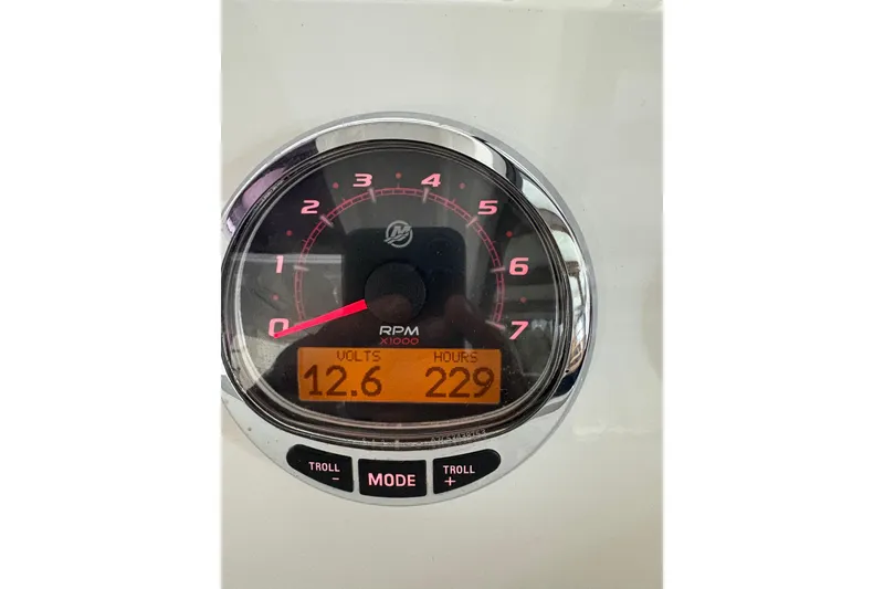Slide: The Image of Close-up of 2020 Protector 310 Targa tachometer displaying 12.6 volts and 229 hours. - 25
