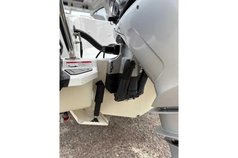 Slide: The Image of 2020 Protector 310 Targa boat engine detail, showcasing motor and components. - 8