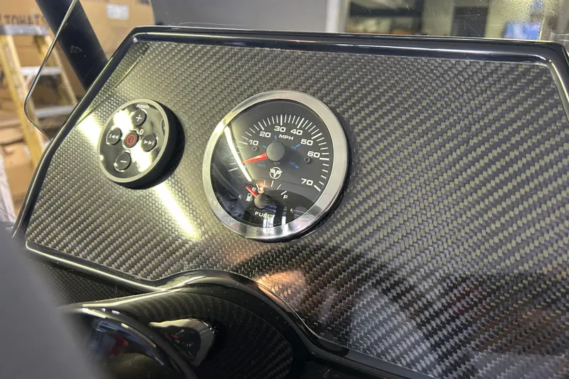 Slide: The Image of Carbon fiber dashboard of 2025 Highfield Sport 360 with speedometer and control panel. - 8