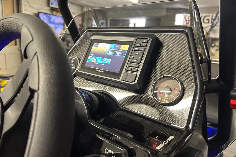 Slide: The Image of 2025 Highfield Sport 360 dashboard with Garmin display and fuel gauge. - 17