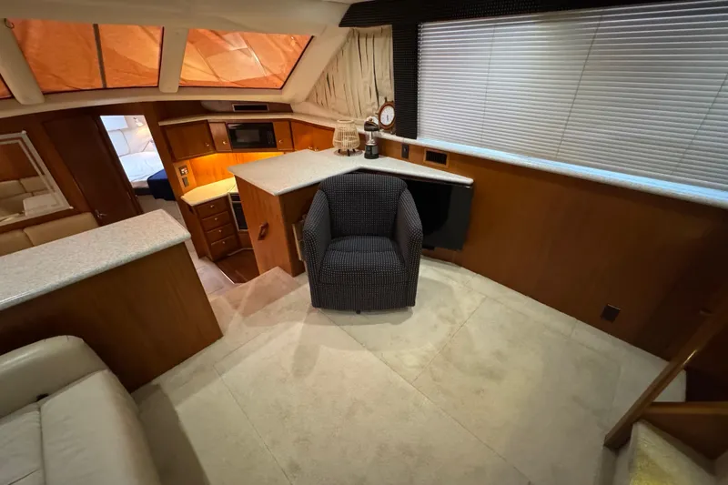 Slide: The Image of Interior of 2000 Carver 406 Aft Cabin Motor Yacht with modern furnishings. - 12