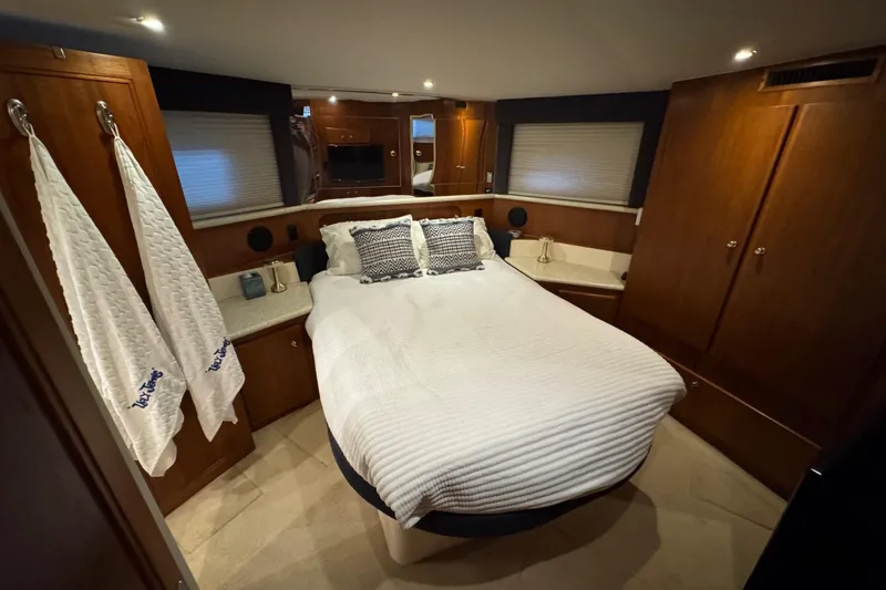Slide: The Image of Luxurious cabin interior of 2000 Carver 406 Aft Cabin Motor Yacht with cozy bed. - 22
