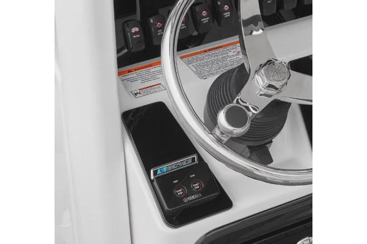 Slide: The Image of 2022 Yamaha Boats 255 FSH Sport E steering wheel and control panel close-up. - 16