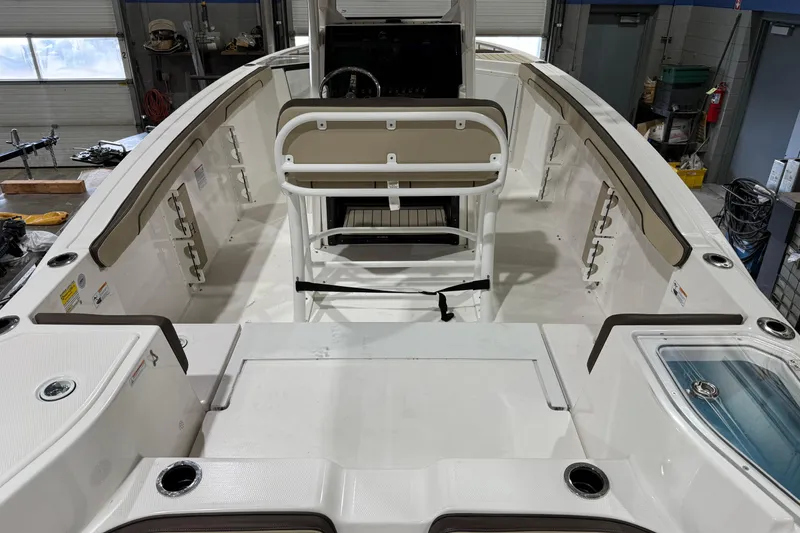 Slide: The Image of 2022 Yamaha Boats 255 FSH Sport E interior, showcasing spacious seating and modern design. - 3