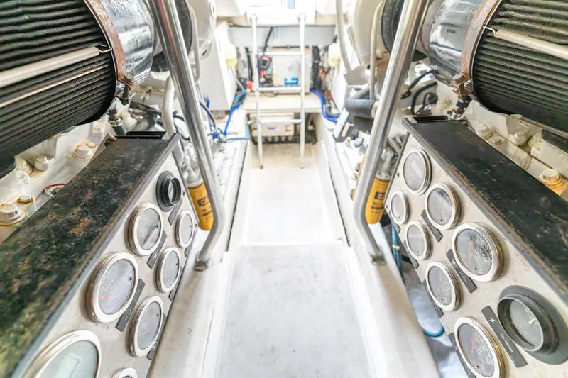 Slide: The Image of Engine room of 2006 Ocean 57 yacht, showcasing machinery and controls. - 41