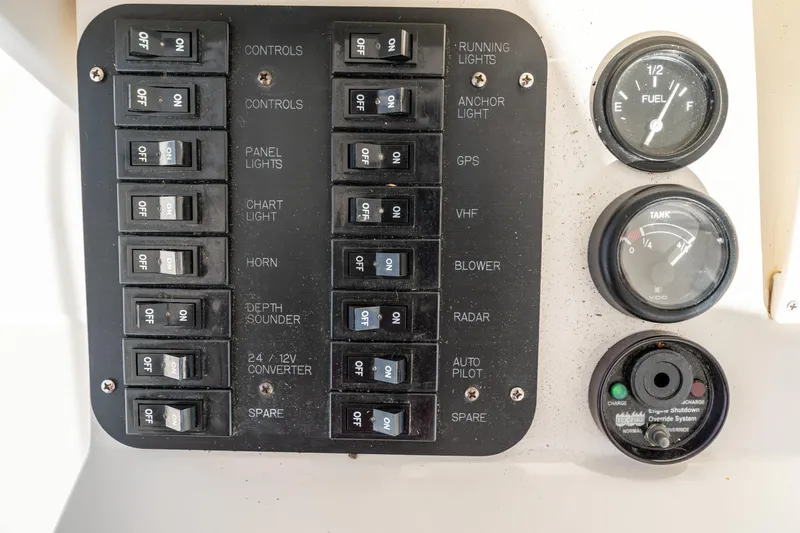 Slide: The Image of Boat control panel with switches and gauges, Ocean 57, 2006 model. - 48