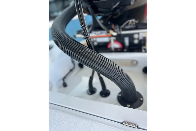 Slide: The Image of Close-up of 2026 Chittum Skiffs 21 Islamorada boat wiring and tubing. - 12