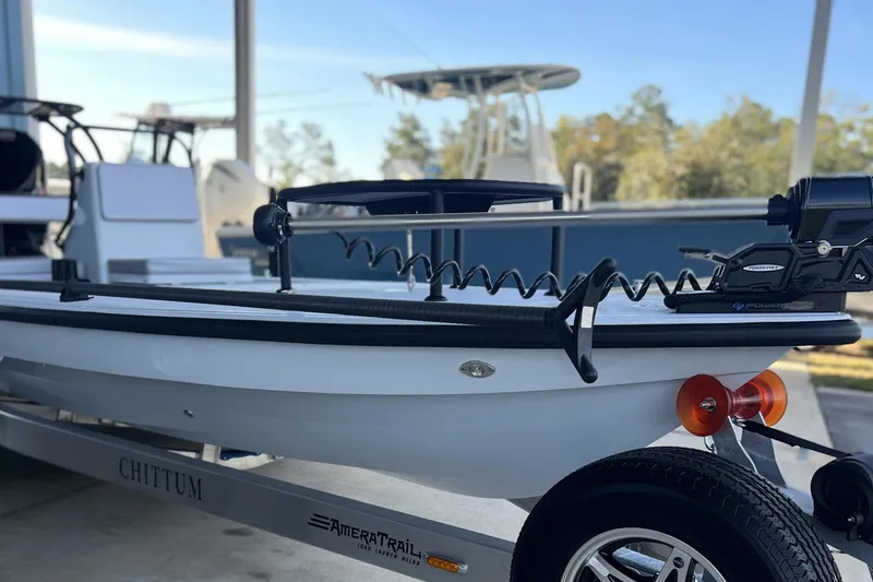 Slide: The Image of 2026 Chittum Skiffs 21 Islamorada boat on trailer, featuring modern design and equipment. - 4