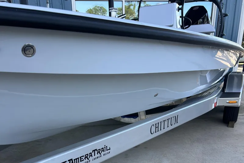 Slide: The Image of 2026 Chittum Skiffs 21 Islamorada boat on trailer, side view. - 6