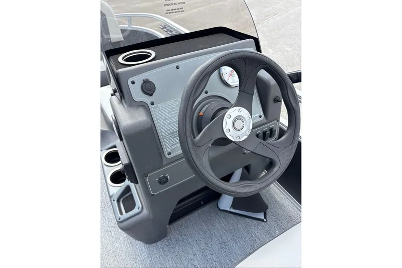 Slide: The Image of Steering console of 2026 Sun Tracker Bass Buggy 16 XL Select pontoon boat. - 4