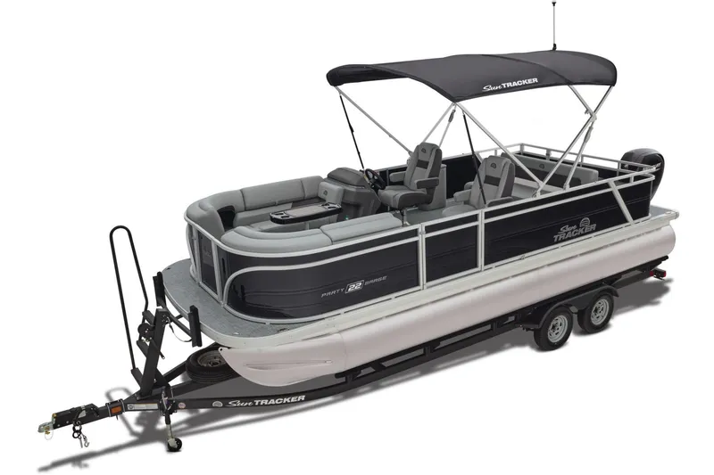 Slide: The Image of 2026 Sun Tracker Party Barge 22 RF DLX pontoon boat with Mercury engine on trailer. - 2