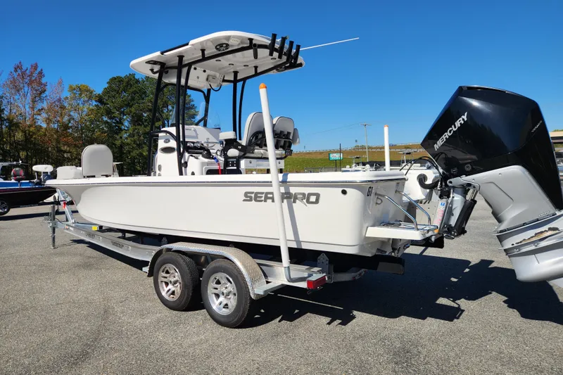 Slide: The Image of 2019 Sea Pro 248 Bay boat on trailer with Mercury outboard engine. - 2