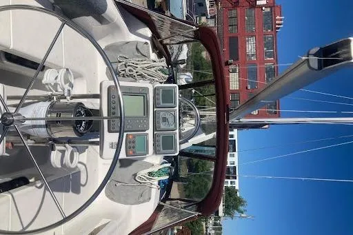 Slide: The Image of Cockpit view of a 2001 Catalina 380 sailboat with navigation instruments. - 2