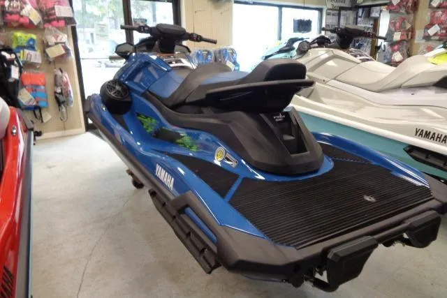Slide: The Image of 2025 Yamaha WaveRunner VX Cruiser HO in showroom, blue and black design. - 5