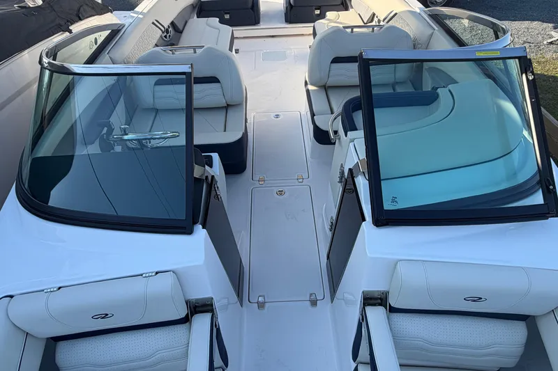 Slide: The Image of 2026 Regal LX6 boat interior with luxurious seating and modern design. - 24