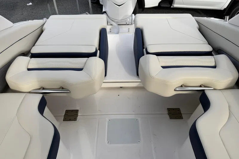 Slide: The Image of Luxurious seating area on a 2026 Regal LX6 boat with stylish upholstery and cushions. - 33