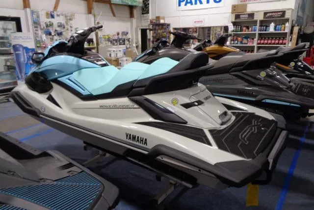 Slide: The Image of 2025 Yamaha WaveRunner FX Cruiser HO in showroom, featuring sleek design and advanced features. - 5
