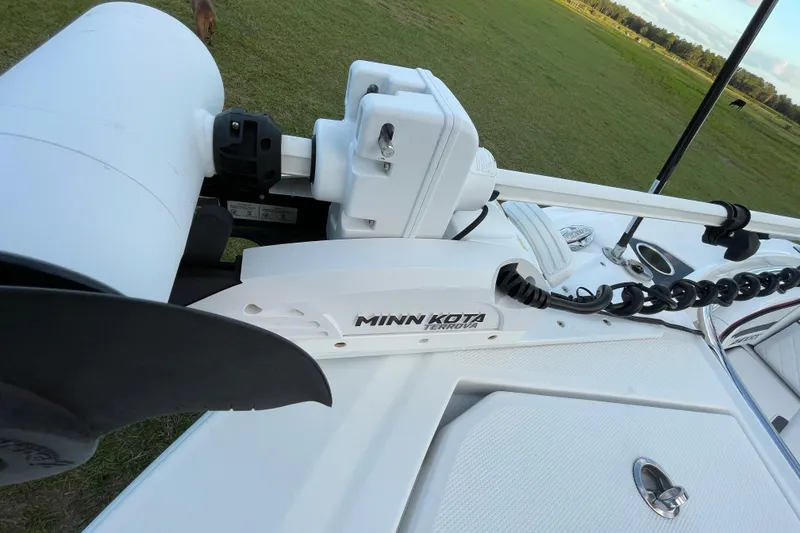 Slide: The Image of 2022 Blackfin 252 CC boat with Minn Kota Terrova trolling motor on deck. - 14