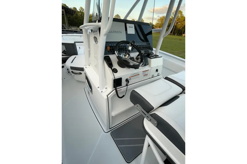 Slide: The Image of 2022 Blackfin 252 CC boat console with Garmin navigation system and seating. - 22