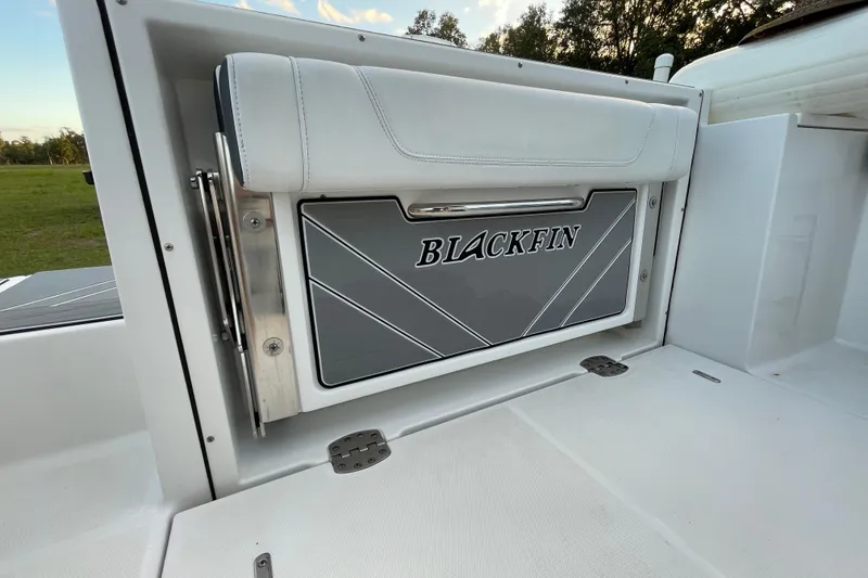 Slide: The Image of 2022 Blackfin 252 CC boat interior with branded seating and sleek design. - 42