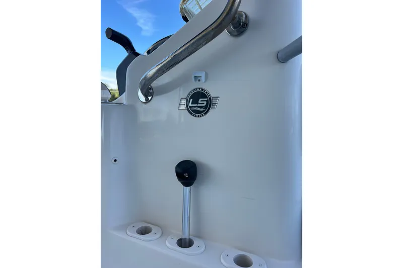Slide: The Image of 2020 Carolina Skiff 21 LS boat console with steering and control features. - 13