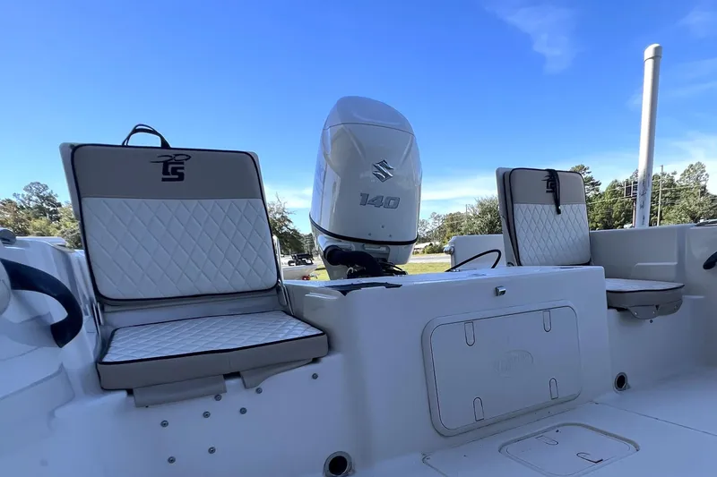 Slide: The Image of 2020 Carolina Skiff 21 LS boat interior with Suzuki 140 outboard motor. - 9