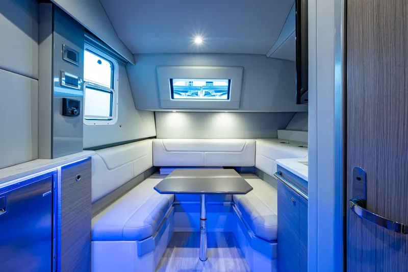 Slide: The Image of 2022 Formula 380 Super Sport Crossover OB interior with modern seating and ambient lighting. - 4