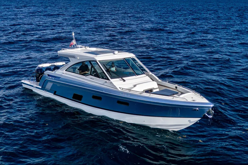 Slide: The Image of 2022 Formula 380 Super Sport Crossover OB cruising on open blue water. - 42