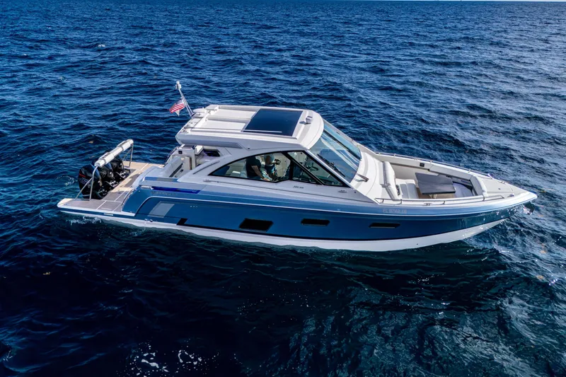 Slide: The Image of 2022 Formula 380 Super Sport Crossover OB cruising on open water. - 43