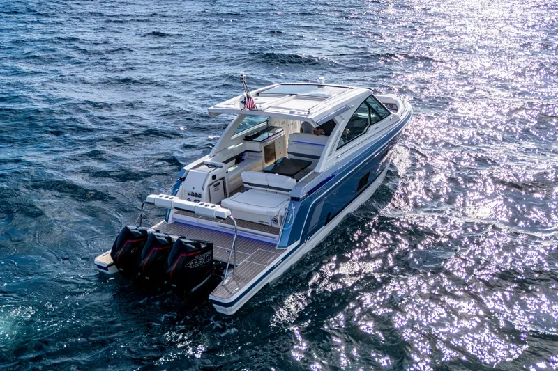 Slide: The Image of 2022 Formula 380 Super Sport Crossover OB cruising on sparkling blue water. - 46