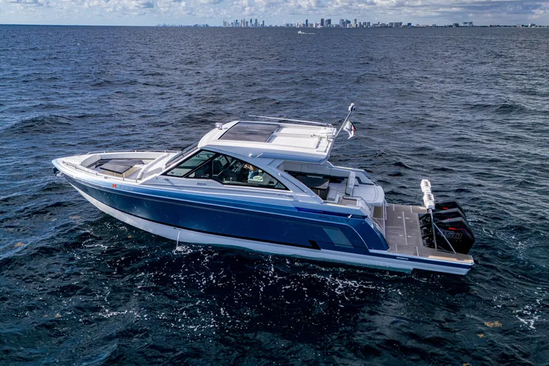 Slide: The Image of 2022 Formula 380 Super Sport Crossover OB cruising on open water. - 50