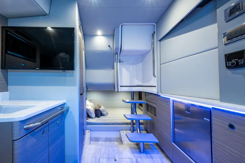 Slide: The Image of Interior of 2022 Formula 380 Super Sport Crossover OB, featuring modern amenities and sleek design. - 7