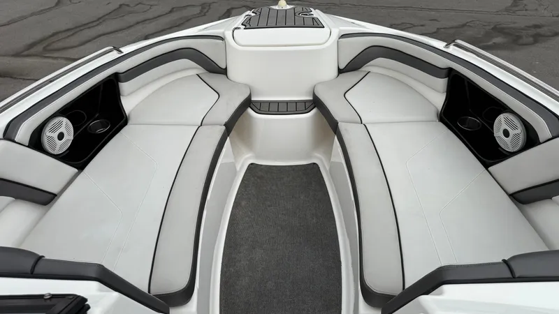 Slide: The Image of 2019 Yamaha Boats AR240 interior with spacious seating and modern design. - 11