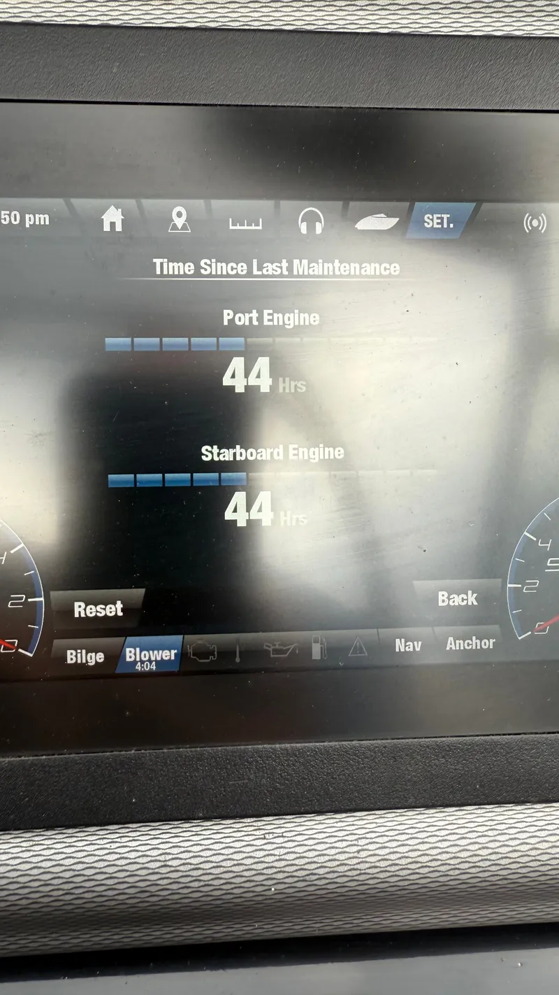 Slide: The Image of Dashboard display of a 2019 Yamaha AR240 boat showing 44 hours on both engines. - 9