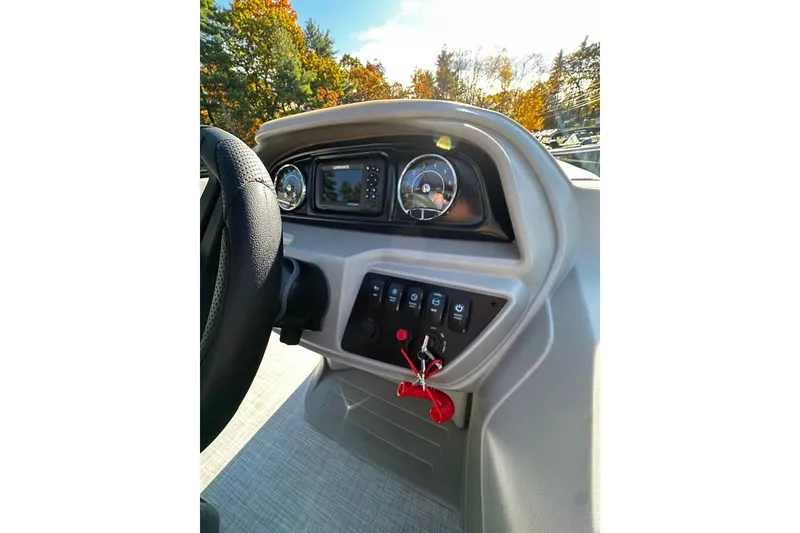 Slide: The Image of Dashboard of 2026 DOCKSIDE 20DQ boat with steering wheel and control panel. - 9
